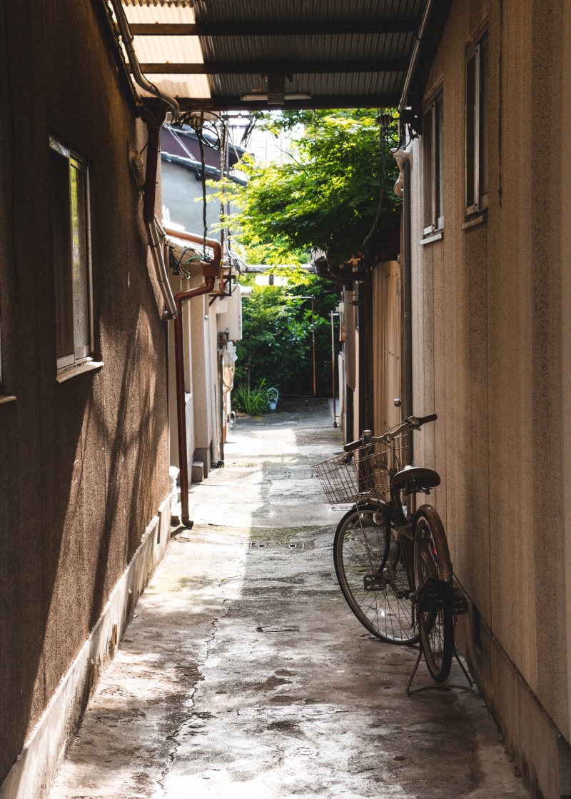 building, bicycle, residential district, footpath, urban, wall, kyoto prefecture, beside, no people, alley, plant, the way forward, architecture, japan