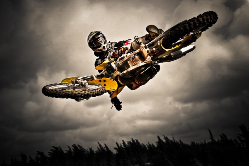 day, nature, extreme sports, low angle view, dirt bikes, bike, motocross, vehicle, outdoors, adventure, mid-air, black, sky, flying, no people, arts culture and entertainment