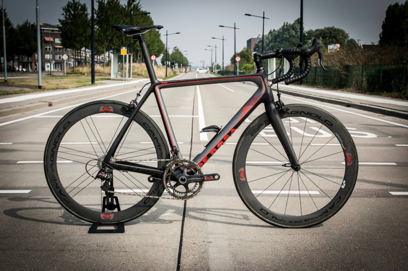 city, outdoors, day, spoke, footpath, nature, bike, mode of transportation, sky, metal, no people, plant, tree, carbon fiber , street, stationary, land vehicle