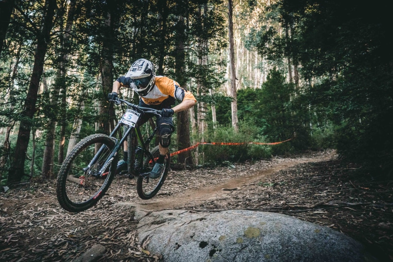 bmx, sports helmet, real people, forest, leisure activity, downhill mountain biking, 5K, day, sport, one person, motion, bike, activity, land, woodland