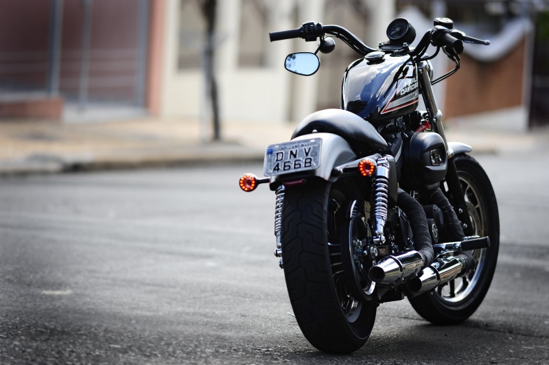 elegance, motorcycle Racing, motorcycle, speed, shiny, black Color, city, biker, transportation, harley, building, harley Davidson, focus on foreground