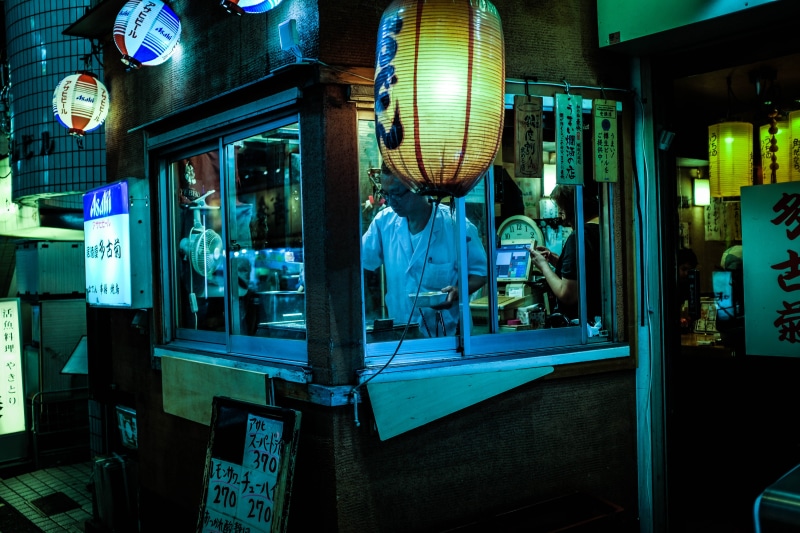 text, bar counter, izakaya, restaurant, lighting equipment, food, travel, food and drink, glass - material, business, architecture, street, illuminated