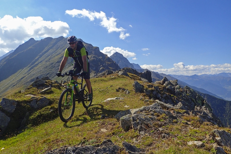 Biking, Mountain Bike, alm, leisure activity, summer, activity, outdoors, helmet, travel, riding, cycling, sport, fun, men, downhill, clouds, mountain