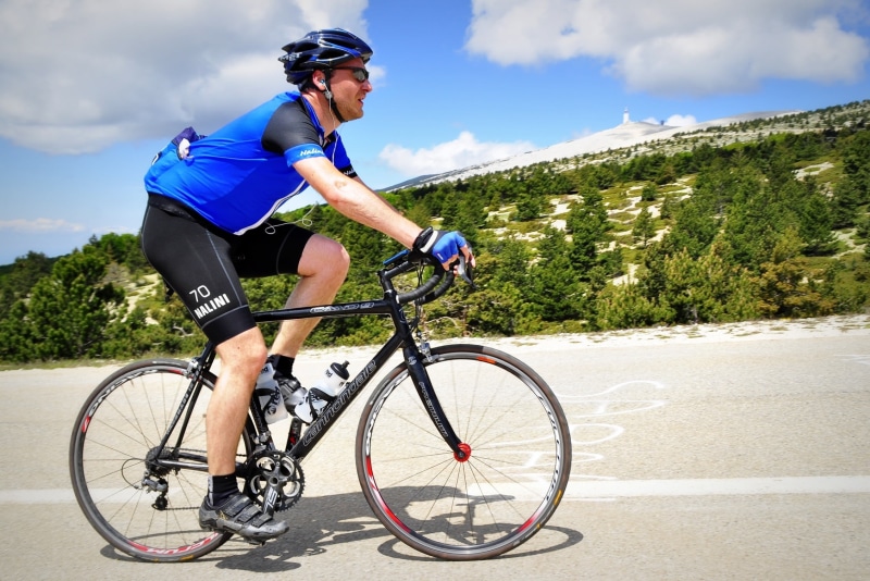 one person, ride, person, climb, leisure activity, mountain, sports, full length, sky, nature, professional road bicycle racer, cloud - sky, real people