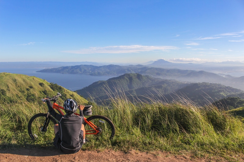grass, helmet, high, beside, mountain biking, cycling, idyllic, scenery, green, mountain range, mountain, bright, transportation, recreation, beauty in nature