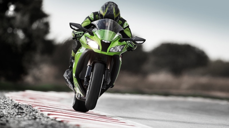 plant, helmet, sports, green, sunlight, Kawasaki ninja, transportation, bike, day, close-up, city, mode of transportation, focus on foreground, bicycle