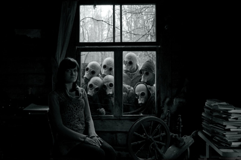 long hair, top, looking at viewer, real people, indoors, glass - material, lifestyles, apocalyptic, representation, transparent, long, domestic room, dark