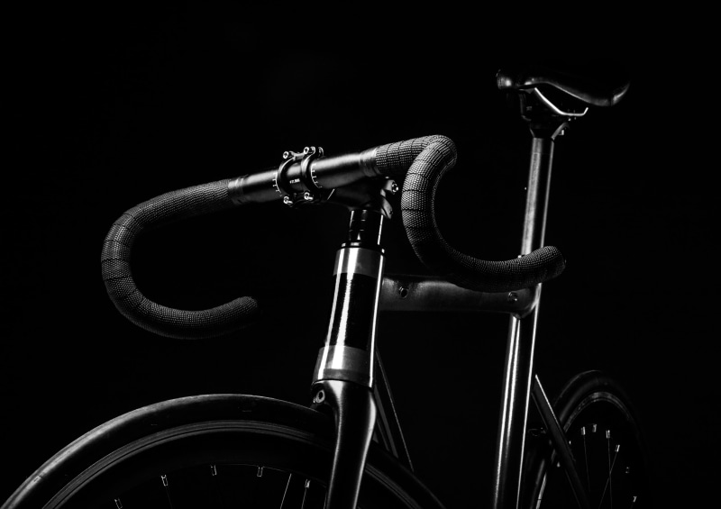 close-up, transportation, grey, road bicycle, fixie, indoors, nature, land vehicle, single Object, cycle, black background, studio shot, microphone, no People