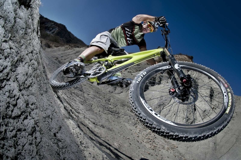 activity, mountains, day, riding, one person, sport , full, adult, transportation, wheel, green, extreme sports, skill, full length, nature, sport, men