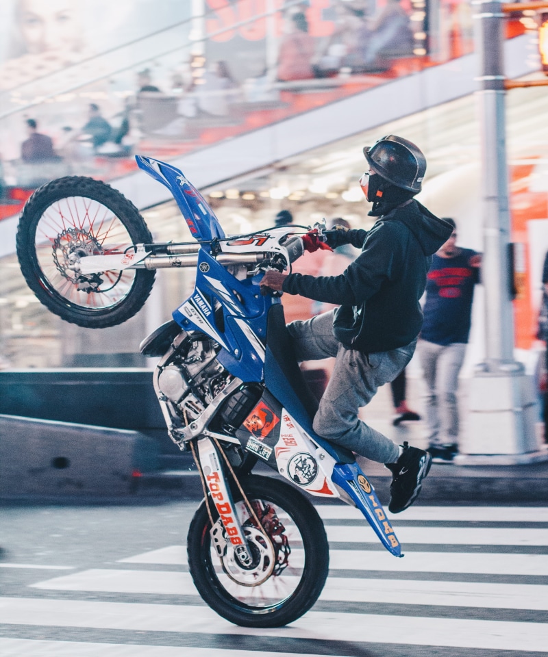land vehicle, city, bicycle, skill, outdoors, focus, yamaha, men, real people, motocross, motorcycle, headwear, ride, riding, leisure activity, dirtbike