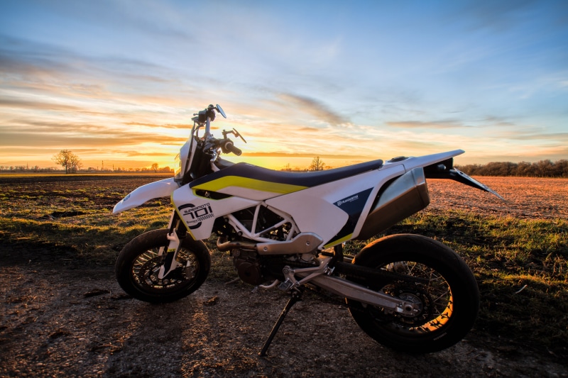 sunlight, crash helmet, stationary, earth, sky, motorcycle, bike, transportation, one person, field, motorcycling, dirt, adventure, husqvarnia, nature