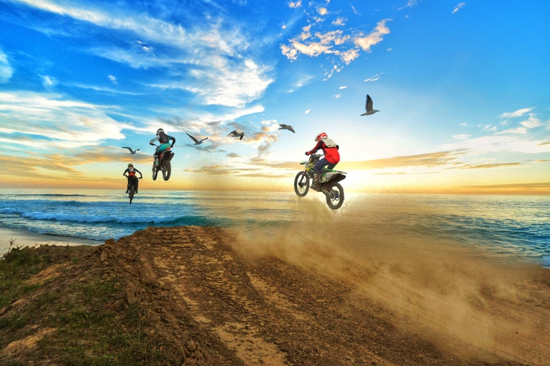 nature, beach, seascape, ramp, full length, motion, sport, land, motocross, dirt, riding, sea, headwear, summer, extreme sports, helmet, motorcycle, men