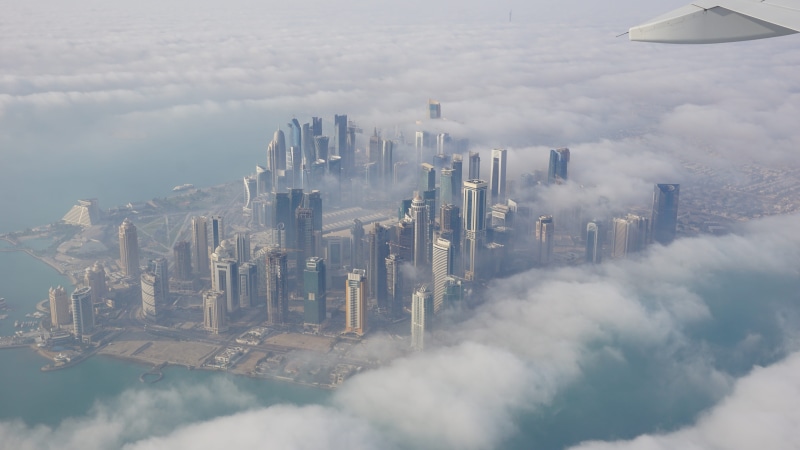 travel, cityscape, daylight, architecture, building Exterior, clouds, city, built Structure, no people, air pollution, business, tower, doha, day, aerial View
