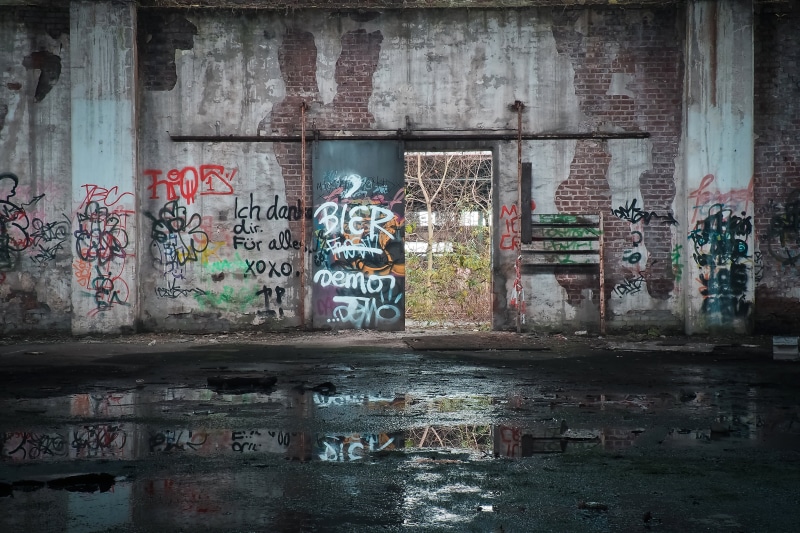 no people, wall - building feature, old factory hall, day, passed, building exterior, outdoors, broken, text, messy, railway station, lost places, goods station