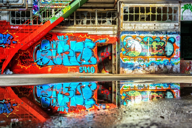 art and craft, mirroring, hall, built structure, emergence, transportation, text, outdoors, street art, lost places, messy, industrial building, lost place