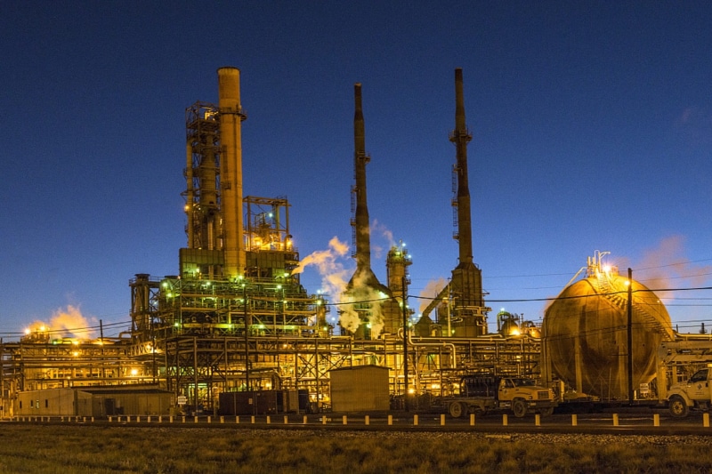 energy, nature, built structure, nuclear plant, clear sky, belief, petroleum, sky, oil, dusk, fence, religion, skyline, blue, architecture, building exterior