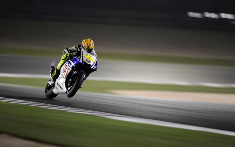 track and field, racing, mode of transportation, sports race, riding, Valentino Rossi, blue, motion, sports helmet, motorcycle, flowering plant, transportation