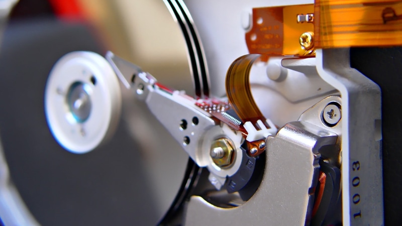 focus on foreground, gray, car, black, indoors, hardware, macro, IT, motor vehicle, land vehicle, part Of, security, metal, close-up, silver colored, music