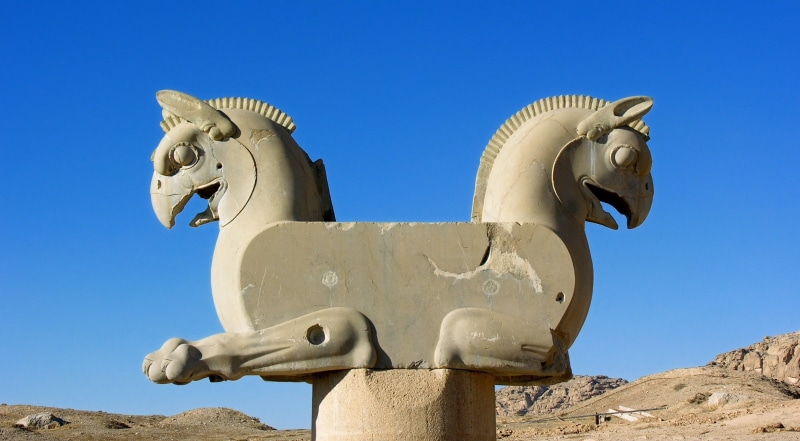 architecture, low angle view, no people, clear sky, ceramic, day, fars province, belief, blue, creativity, outdoors, animal, religion, sculpture, statue