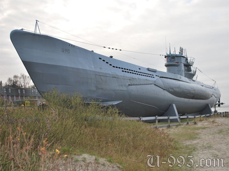 nautical vessel, sky, cruise ship, grass, travel, mode of transportation, cargo, U-Boot, military, communication, ship, World War II, air vehicle, day