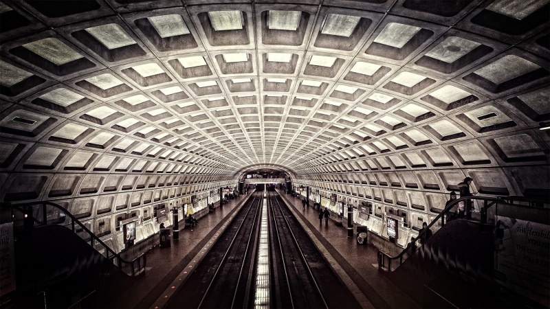 diminishing perspective, architecture, travel, subway station, rails, built structure, transit, stairs, station, pattern, rail, direction, train, metro