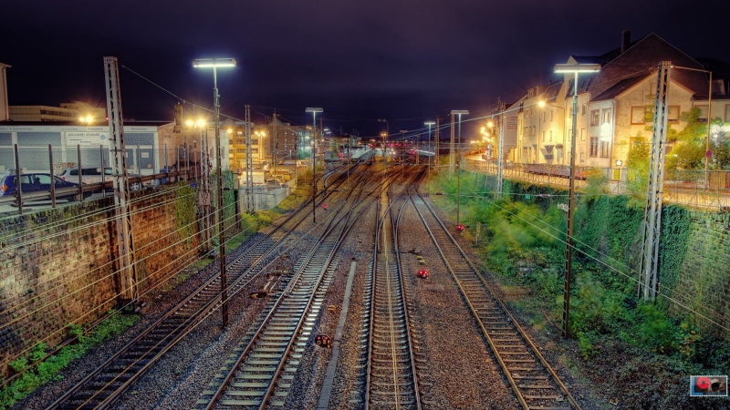 train, illuminated, mode of transportation, black, night, built structure, public transportation, railroad station, railway, building exterior, track, the way forward