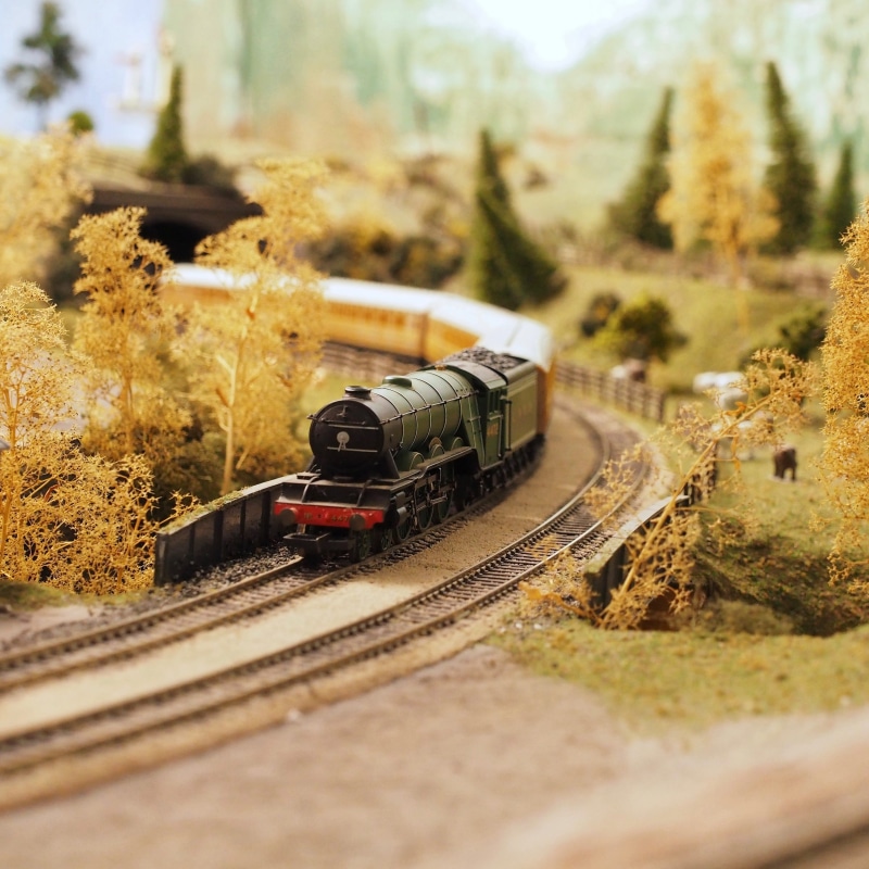 outdoors, train tracks, travel, railroad track, day, rails, railway, no people, grass, historic, plant, train station, architecture, black, track, blur