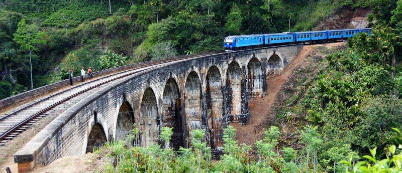 surrounded, green, sri lanka, ella, rail transportation, built structure, blue, mode of transportation, train, bridge - man made structure, railway, track