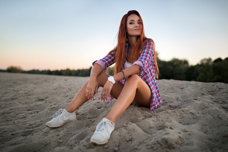 sitting, hairstyle, redhead, legs, shorts, the evening, trees, model, pose, the sky, beauty, shirt, bokeh, Dmitry Sn, makeup, 1080P, portrait, sneakers