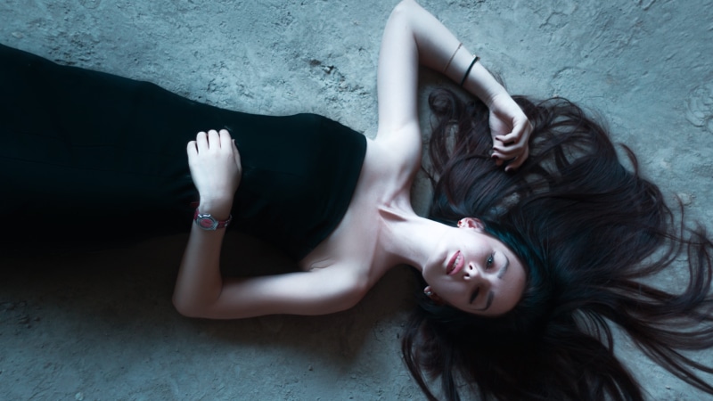 adults only, girl lying on the floor, black hair, only women, one woman only, lips, 4K, lying down, model, on the floor, woman, legs, background, girl