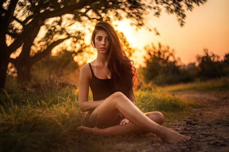 one person, fashion, contemplation, beauty, s, long hair, leisure activity, adult, lifestyles, feet, nature, sunset, Julia Carina, land, hairstyle, beautiful woman
