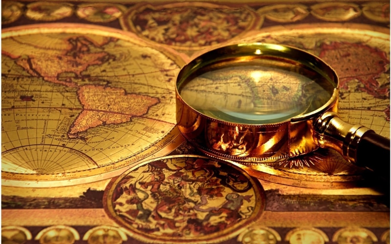 vintage, magnifying glass, no people, 1080P, discovery, magnifying glasses, exploration, close-up, world map, currency, indoors, direction, business, glass
