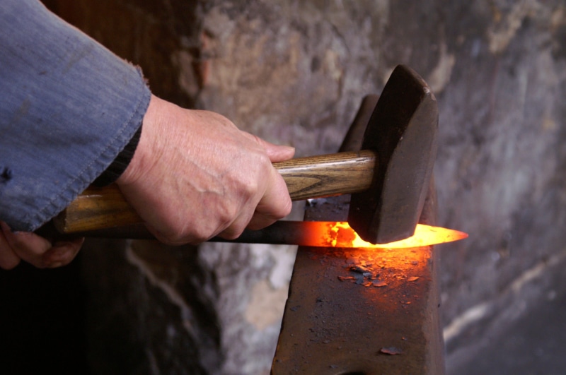 steel, one person, adult, fire, art and craft, hot, 2K, men, alloy, workshop, hammer, human body part, occupation, hand, glow, blacksmith, craft, blacksmithing