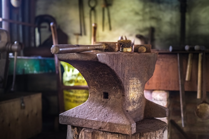 focus on foreground, 5K, heat, shallow, abandoned, strength, old, close-up, craft, anvil, no people, heavy, workshop, tool, handwork, manual, blacksmith