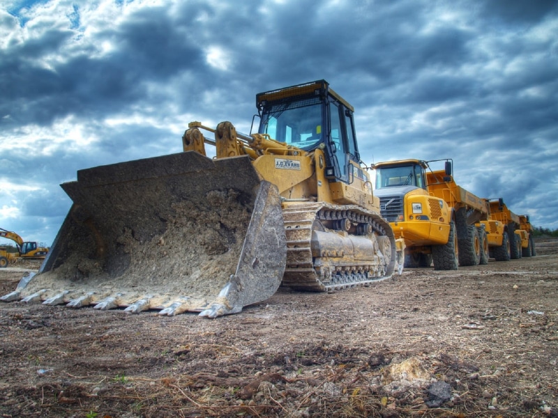 construction, construction vehicle, mode of transportation, machines, sky, close up, field, machinery, vehicle, machine, front, land vehicle, front end loader