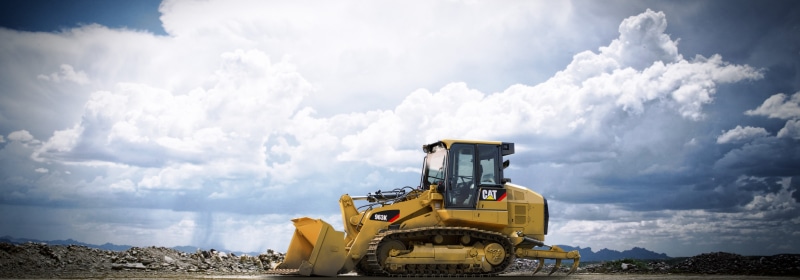 construction equipment, loader, work machine, dozer, blade, outdoors, front, road, construction site, yellow, cloud - sky, transportation, caterpillar