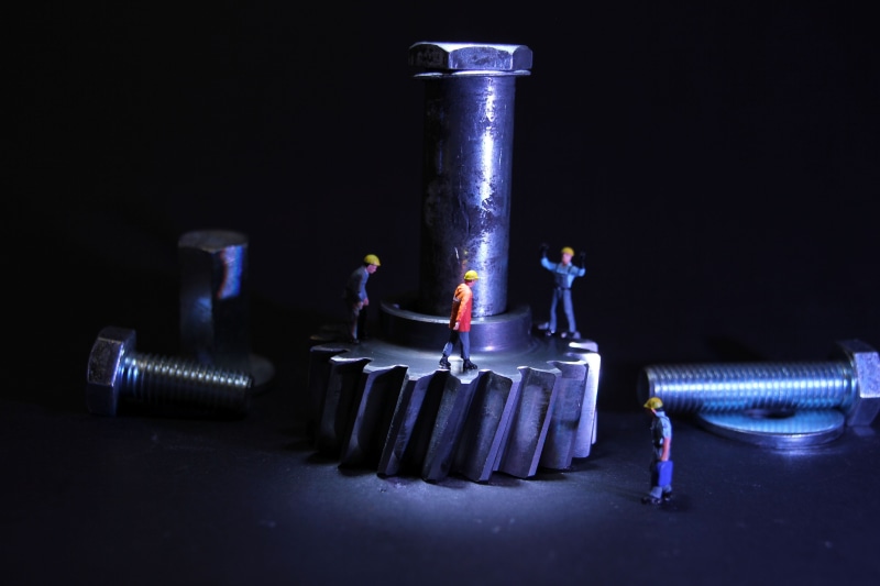 mite, rusty, close, still life, industry, no people, modelleisenbahn figure, gear, black background, old, repair, mechanics, thw, humorous, indoors, technology