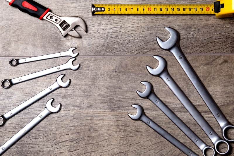 key, wrench, roulette, adjustable wrench, repair, scissors, group of objects, close-up, occupation, industry, eight, metal, tool, indoors, gray, still life
