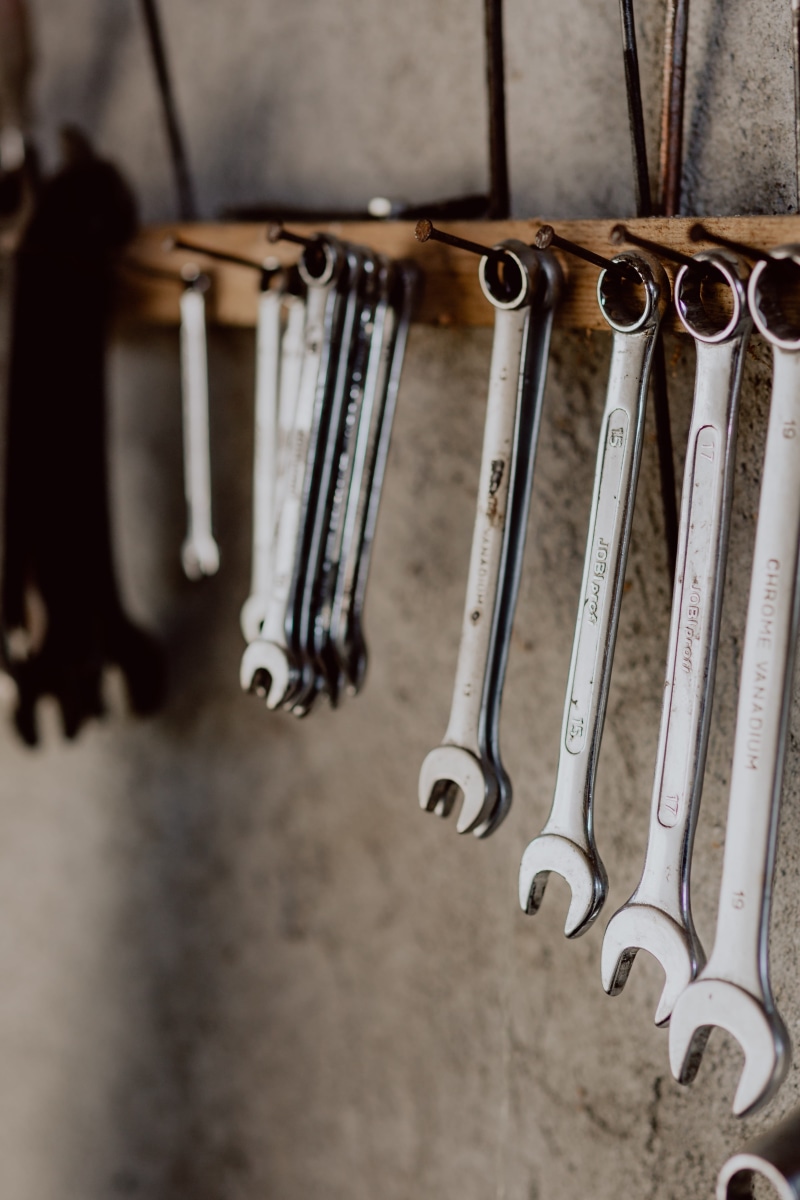 wall - building feature, no people, screwdriver, security, weapon, ring, toolbox, choice, open, close-up, metal, medium group of objects, rack, tools, mechanic