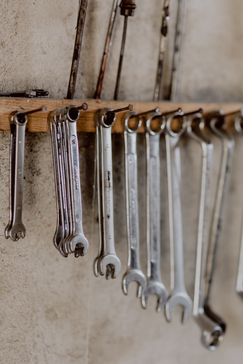 repair, mechanic, wrench, wall - building feature, wall, close-up, set, metal, toolbox, 5K, workshop, screwdriver, large group of objects, indoors, group