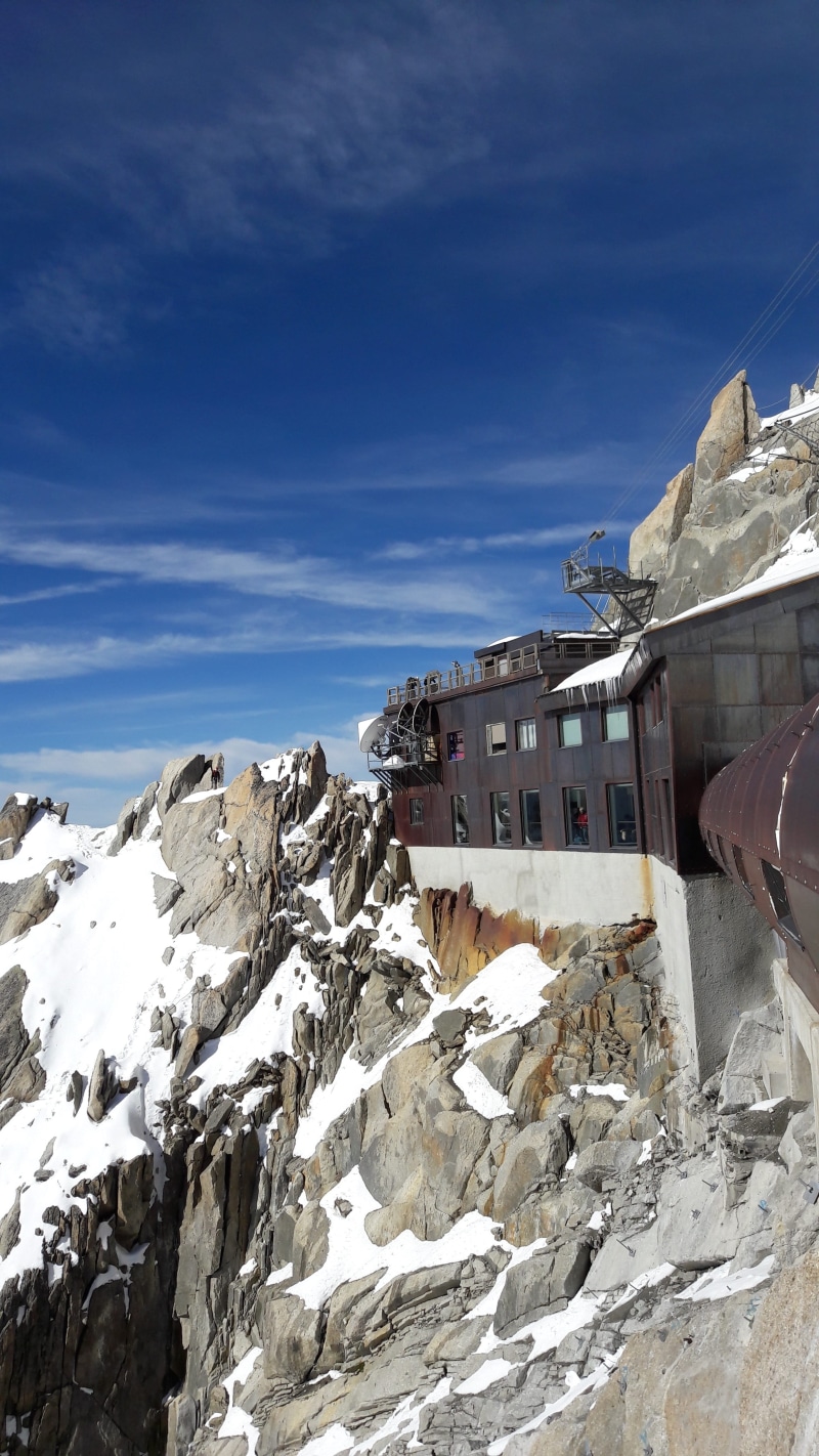 scenics - nature, no people, nature, white color, beauty in nature, snow, 4K, mountain, building, tranquility, mountain range, outdoors, aiguille du midi