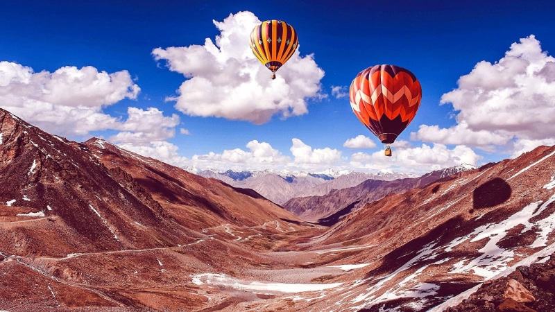 india, mid-air, formation, daytime, rock formation, fluffy clouds, balloon, travel, ladakh mountains, non-urban scene, atmosphere of earth, no people, rock - object