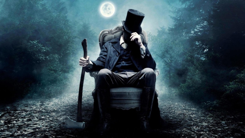 front view, depression - sadness, Movie, adult, clothing, emotion, chair, males, spooky, full length, men, seat, mystery, one person, despair, Abraham Lincoln: Vampire Hunter