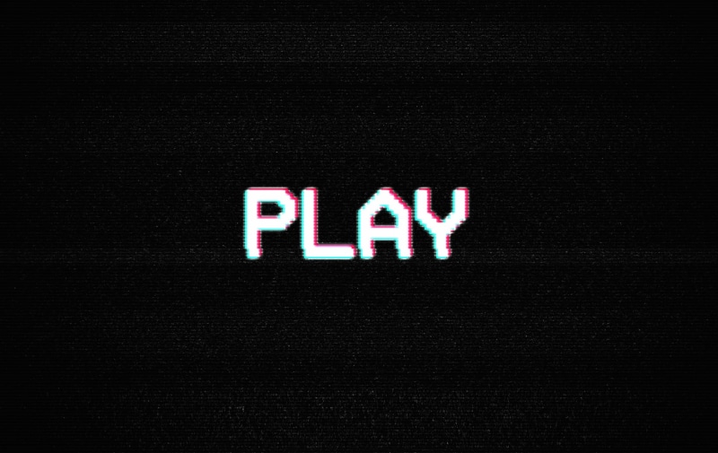 single word, no people, indoors, tv, neon, technology, capital letter, cassette, video cassette, dark, recording, black background, play, studio shot, video