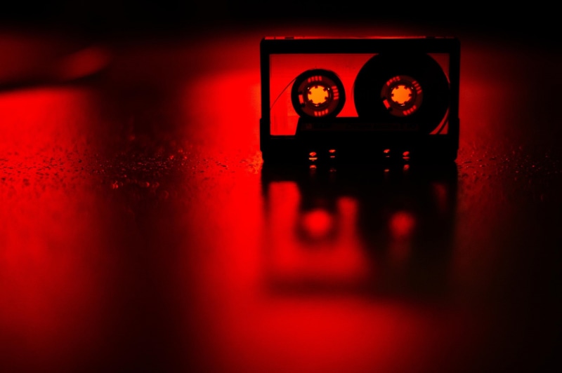 red, table, technology, selective focus, nightlife, equipment, clock, arts culture and entertainment, reflection, photography themes, shadow, dark, time