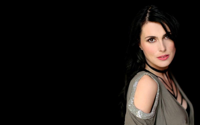 studio shot, indoors, hairstyle, standing, beauty, dress, symphonic metal, gray, black hair, singer, Within Temptation, adult, hair, lifestyles, women