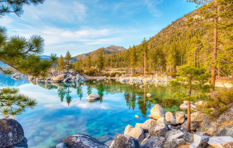 water, forest, lake, tranquil scene, rock - object, no people, stones, sky, nature, rock, idyllic, scenics - nature, beauty in nature, turquoise colored