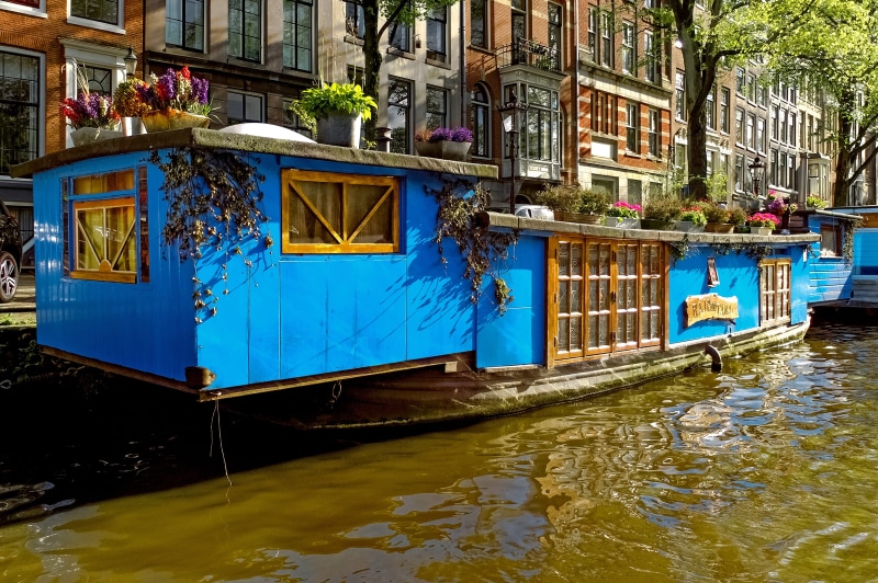 barge, amsterdam, water, brown, canal, city, boat, building exterior, blue, building, architecture, no people, netherlands, outdoors, nautical vessel, holland