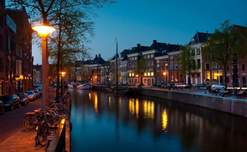 architecture, mode of transportation, Canal, night, water, building, bicycle, waterfront, car, sky, Netherlands, lot, city, dusk, street, Groningen, building exterior
