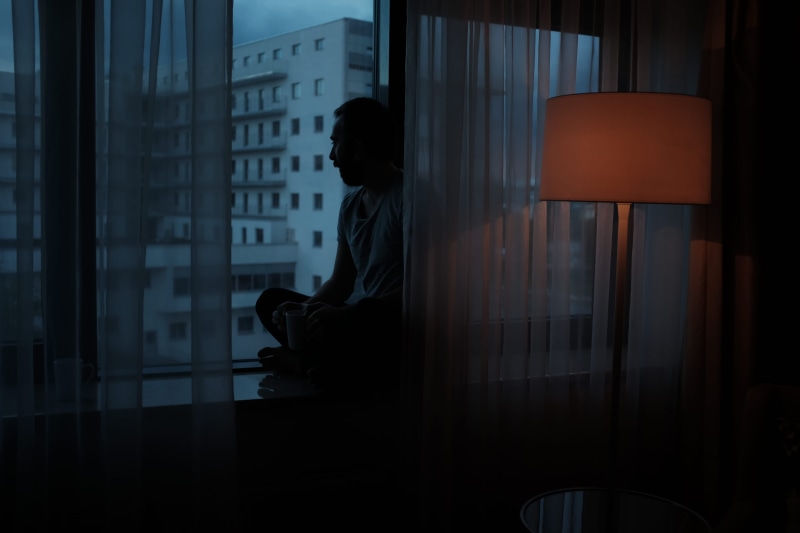 window, man, high, adult, person, night, electric lamp, architecture, glass, looking out, leisure activity, indoors, contemplation, hotel, rise, women